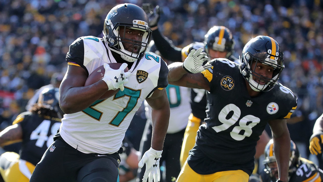 PITTSBURGH, PA - JANUARY 14: Leonard Fournette #27 of the Jacksonville Jaguars rushes for an 18 yard touchdown in the first quarter during the AFC Divisional Playoff game against the Pittsburgh Steelers at Heinz Field on January 14, 2018 in Pittsburgh, Pennsylvania.