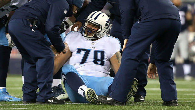 FOXBOROUGH, MA - JANUARY 13: Jack Conklin #78 of the Tennessee Titans is injured in the second quarter of the AFC Divisional Playoff game against the New England Patriots at Gillette Stadium on January 13, 2018 in Foxborough, Massachusetts.