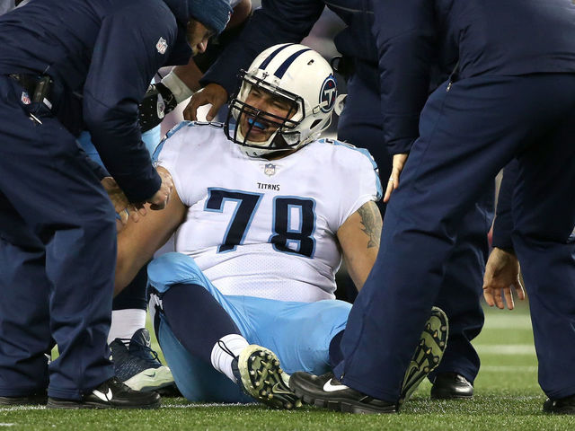 FOXBOROUGH, MA - JANUARY 13: Jack Conklin #78 of the Tennessee Titans is injured in the second quarter of the AFC Divisional Playoff game against the New England Patriots at Gillette Stadium on January 13, 2018 in Foxborough, Massachusetts.