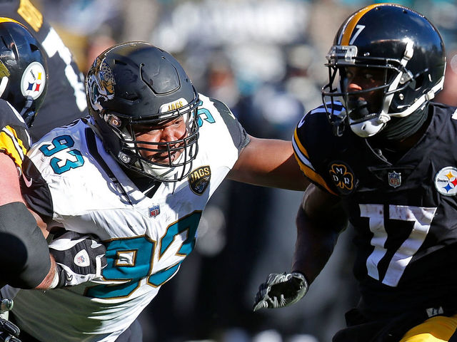 PITTSBURGH, PA - JANUARY 14: Eli Rogers #17 of the Pittsburgh Steelers runs up field against Calais Campbell #93 of the Jacksonville Jaguars after a reception in the first half during the AFC Divisional Playoff game at Heinz Field on January 14, 2018 in Pittsburgh, Pennsylvania.