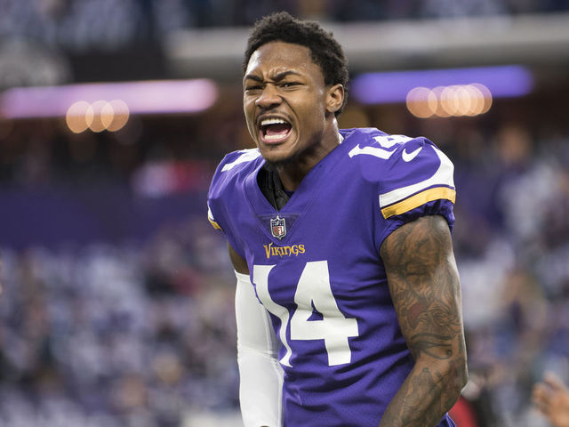 MINNEAPOLIS, MN - JANUARY 14: Stefon Diggs #14 of the Minnesota Vikings warms up before the NFC Divisional Playoff game against the New Orleans Saints on January 14, 2018 at U.S. Bank Stadium in Minneapolis, Minnesota.