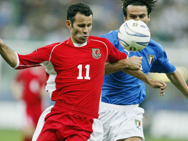 MILAN, ITALY - SEPTEMBER 6: Ryan Giggs of Wales battles with Christian Panucci of Italy during the Euro 2004 Qualifier Group 9 match between Italy and Wales at the San Siro on September 6, 2003 in Milan, Italy.