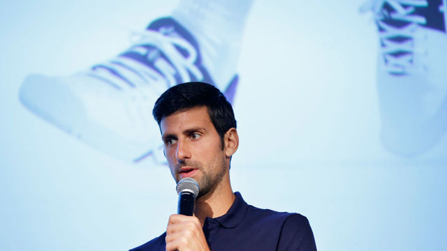 MELBOURNE, AUSTRALIA - JANUARY 11: Novak Djokovic speaks to the media during an ASICS Brand Ambassador Announcement on Batman Avenue Bridge on January 11, 2018 in Melbourne, Australia.
