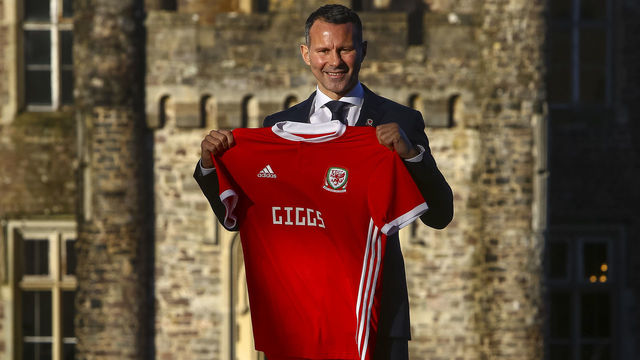 Newly appointed football manager of Wales, Ryan Giggs poses for photographers at the Hensol Castle hotel, south Wales on January 15, 2018. Former Manchester United great Ryan Giggs has been appointed as the new manager of Wales, the Football Association of Wales announced January 15, 2018. / AFP PHOTO / GEOFF CADDICK