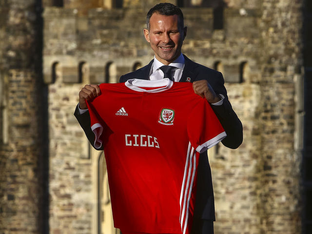 Newly appointed football manager of Wales, Ryan Giggs poses for photographers at the Hensol Castle hotel, south Wales on January 15, 2018. Former Manchester United great Ryan Giggs has been appointed as the new manager of Wales, the Football Association of Wales announced January 15, 2018. / AFP PHOTO / GEOFF CADDICK