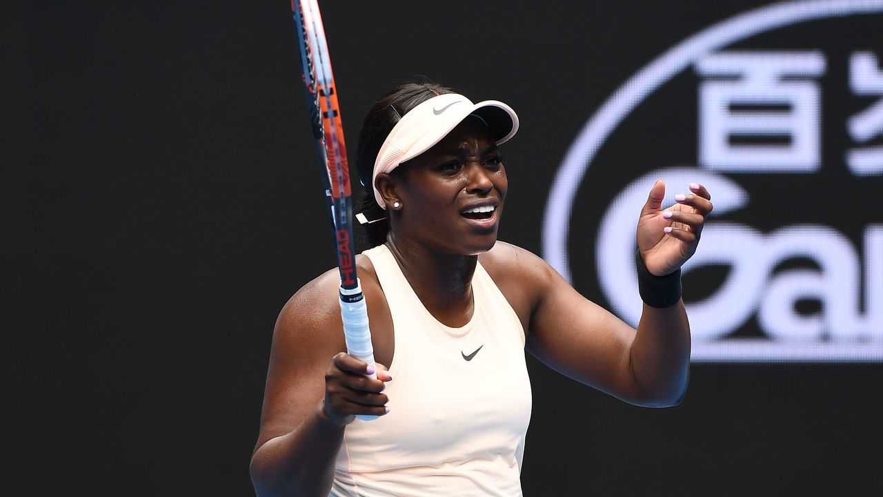 MELBOURNE, AUSTRALIA - JANUARY 15: Sloane Stephens of the United States reacts in her first round match against Shuai Zhang of China on day one of the 2018 Australian Open at Melbourne Park on January 15, 2018 in Melbourne, Australia.
