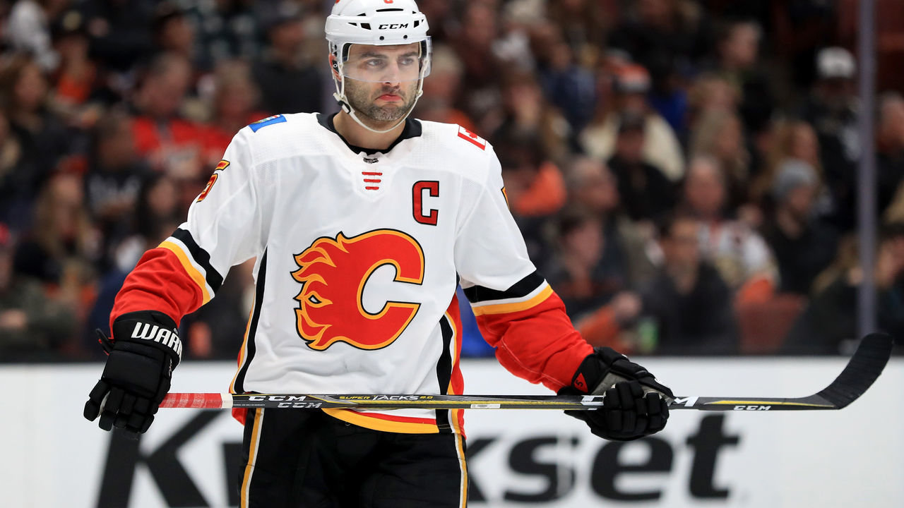 ANAHEIM, CA - DECEMBER 29: Mark Giordano #5 of the Calgary Flames looks on during the first period of a game against the Anaheim Ducks at Honda Center on December 29, 2017 in Anaheim, California.