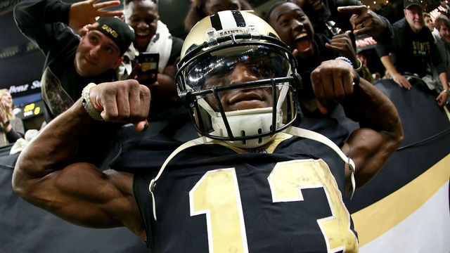 NEW ORLEANS, LA - JANUARY 07: Michael Thomas #13 of the New Orleans Saints reacts after his team defeated the Carolina Panthers during the NFC Wild Card playoff game at the Mercedes-Benz Superdome on January 7, 2018 in New Orleans, Louisiana.