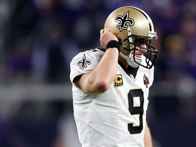 MINNEAPOLIS, MN - JANUARY 14: Quarterback Drew Brees #9 of the New Orleans Saints walks off the field after failing to make a first down during the NFC divisional round playoff game against the Minnesota Vikings at U.S. Bank Stadium on January 14, 2018 in Minneapolis, Minnesota.