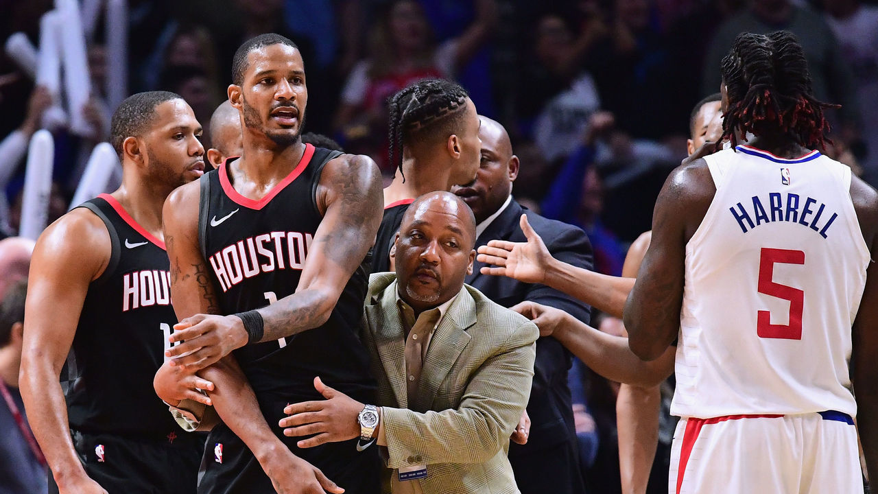 LOS ANGELES, CA - JANUARY 15: Trevor Ariza #1 of the Houston Rockets is restrained by an assistant coach before his ejection from the game during a 113-102 LA Clippers win at Staples Center on January 15, 2018 in Los Angeles, California.