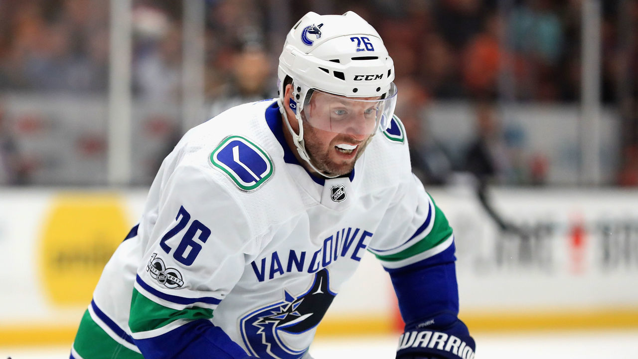 ANAHEIM, CA - NOVEMBER 09: Thomas Vanek #26 of the Vancouver Canucks skates to a loose puck during the second period of a game against the Anaheim Ducks at Honda Center on November 9, 2017 in Anaheim, California.