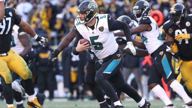 PITTSBURGH, PA - JANUARY 14: Blake Bortles #5 of the Jacksonville Jaguars runs with the ball against the Pittsburgh Steelers during the second half of the AFC Divisional Playoff game at Heinz Field on January 14, 2018 in Pittsburgh, Pennsylvania.