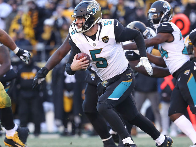 PITTSBURGH, PA - JANUARY 14: Blake Bortles #5 of the Jacksonville Jaguars runs with the ball against the Pittsburgh Steelers during the second half of the AFC Divisional Playoff game at Heinz Field on January 14, 2018 in Pittsburgh, Pennsylvania.