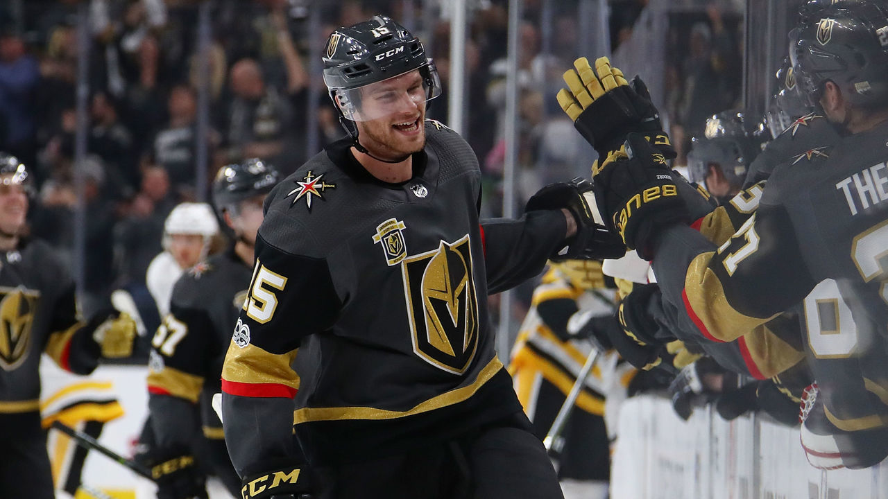 LAS VEGAS, NV - DECEMBER 14: Jon Merrill #15 of the Vegas Golden Knights celebrates his third period goal with teammates while playing the Pittsburgh Penguins at T-Mobile Arena on December 14, 2017 in Las Vegas, Nevada. The Golden Knights won 2-1.