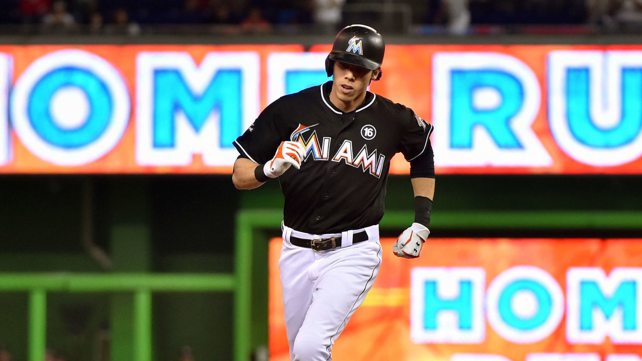 MIAMI, FL - JULY 29: Christian Yelich #21 of the Miami Marlins rounds second base after hitting a home run in the third inning against the Cincinnati Reds at Marlins Park on July 29, 2017 in Miami, Florida.
