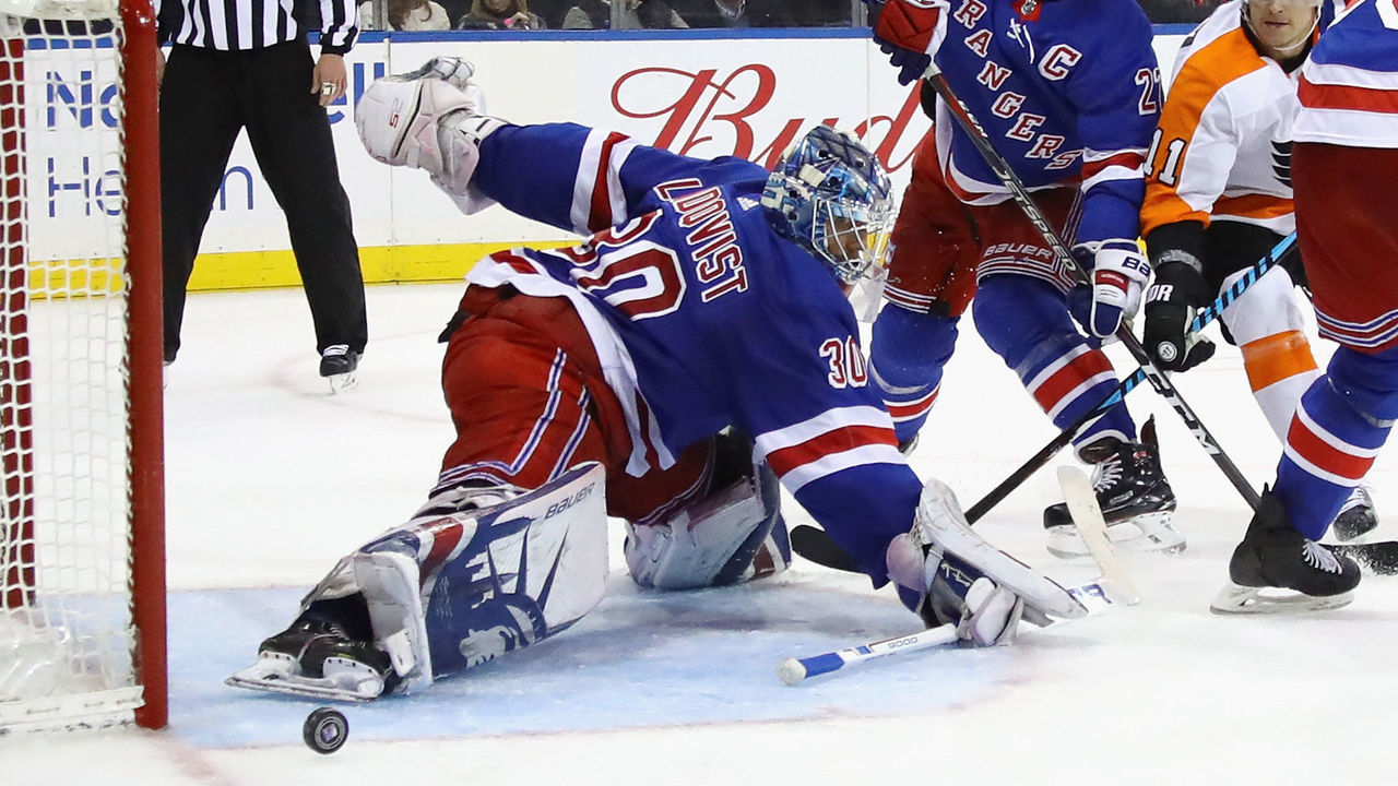 NEW YORK, NY - JANUARY 16: Henrik Lundqvist #30 of the New York Rangers makes the kick save during the third period against the Philadelphia Flyers at Madison Square Garden on January 16, 2018 in New York City. The Rangers defeated the Flyers 5-1. With the victory Lundqvist recirded his 424th NHL win and passed Tony Espoito by moving into 8th place all time.