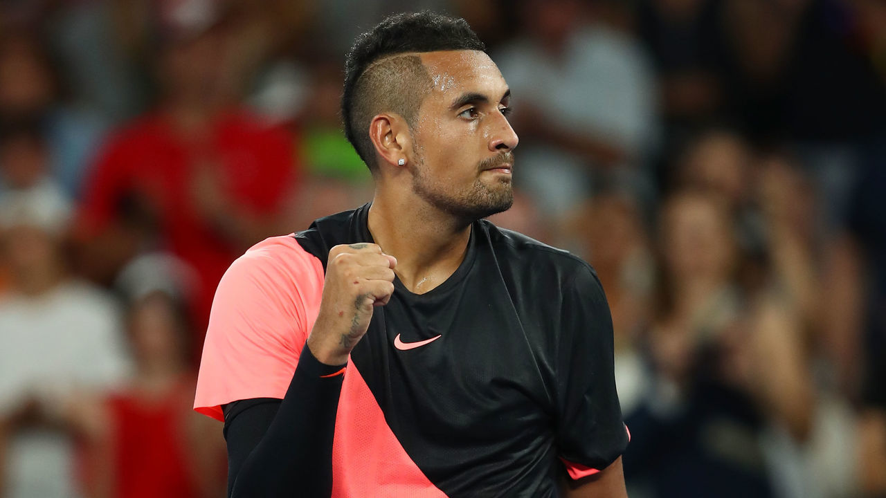 MELBOURNE, AUSTRALIA - JANUARY 17: Nick Kyrgios of Australia celebrates winning match point in his second round match against Viktor Troicki of Serbia on day three of the 2018 Australian Open at Melbourne Park on January 17, 2018 in Melbourne, Australia.
