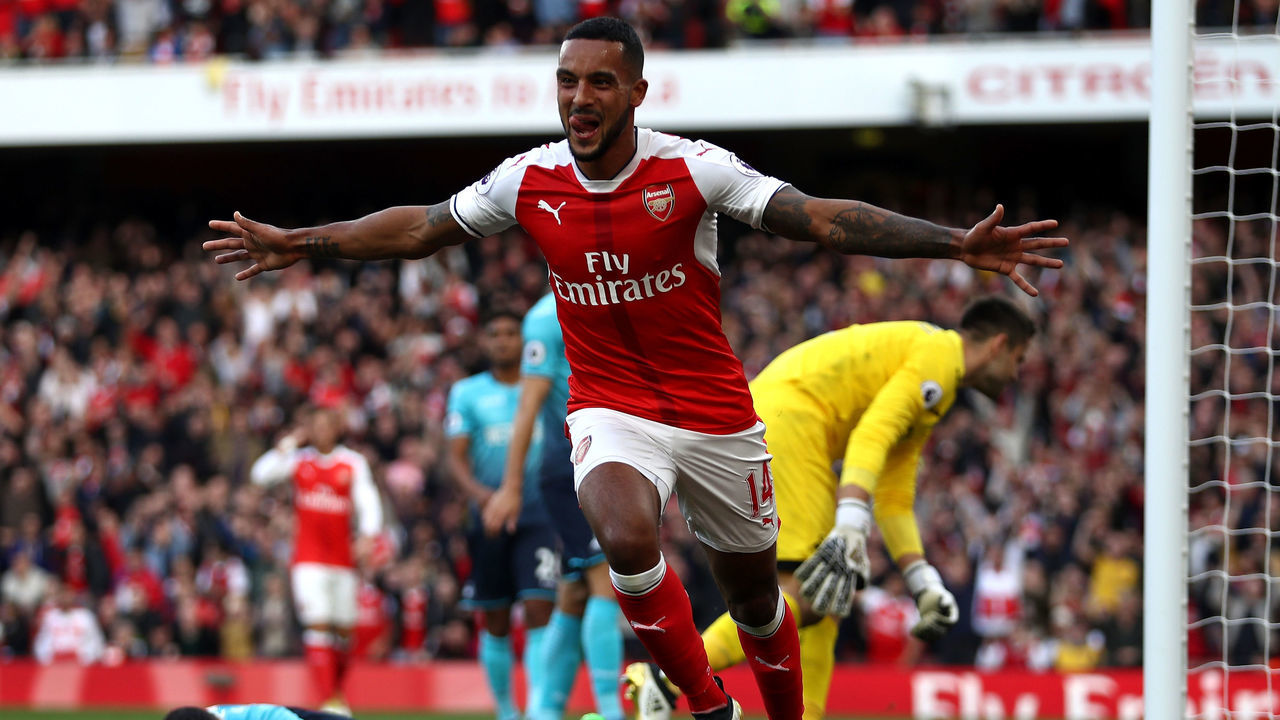 LONDON, ENGLAND - OCTOBER 15: Theo Walcott of Arsenal celebrates scoring his sides first goal during the Premier League match between Arsenal and Swansea City at Emirates Stadium on October 15, 2016 in London, England.