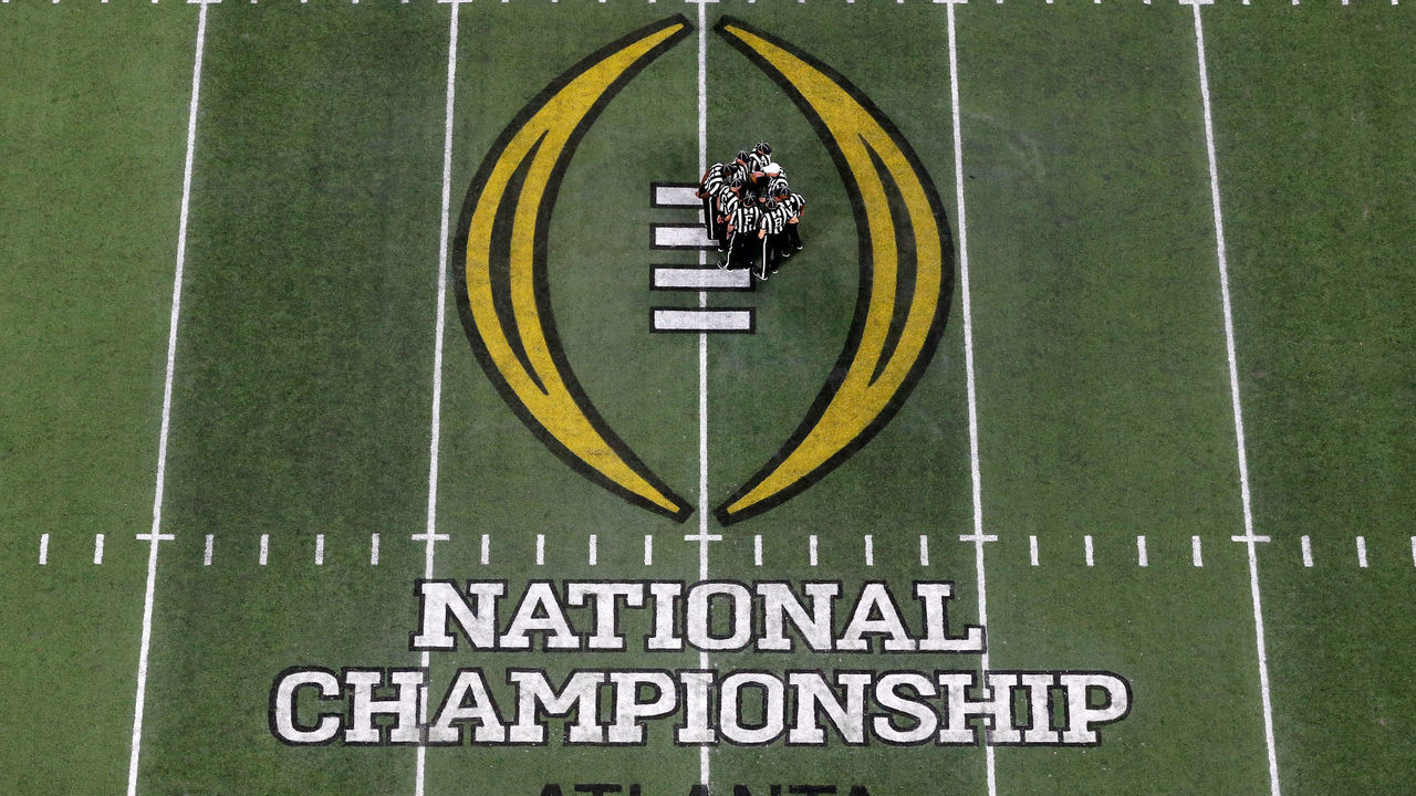 ATLANTA, GA - JANUARY 08: NCAA Officials get ready for overtime between the Georgia Bulldogs and the Alabama Crimson Tide in the CFP National Championship presented by AT&T at Mercedes-Benz Stadium on January 8, 2018 in Atlanta, Georgia.