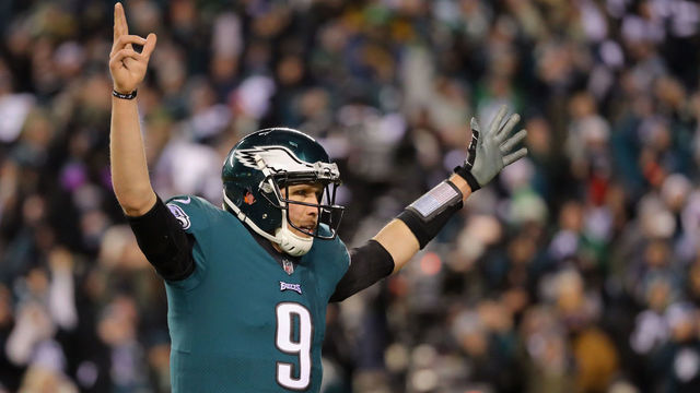 PHILADELPHIA, PA - JANUARY 13: Nick Foles #9 of the Philadelphia Eagles celebrates after LeGarrette Blount #29 scored a 1 yard touchdown against the Atlanta Falcons during the second quarter in the NFC Divisional Playoff game at Lincoln Financial Field on January 13, 2018 in Philadelphia, Pennsylvania.