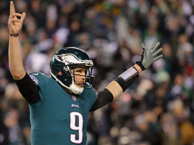 PHILADELPHIA, PA - JANUARY 13: Nick Foles #9 of the Philadelphia Eagles celebrates after LeGarrette Blount #29 scored a 1 yard touchdown against the Atlanta Falcons during the second quarter in the NFC Divisional Playoff game at Lincoln Financial Field on January 13, 2018 in Philadelphia, Pennsylvania.