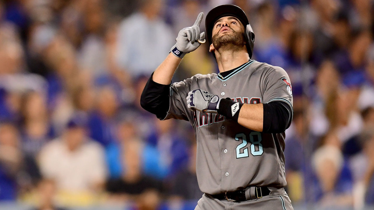 LOS ANGELES, CA - OCTOBER 06: J.D. Martinez #28 of the Arizona Diamondbacks celebrates after hitting a solo home run in the sixth inning against the Los Angeles Dodgers in game one of the National League Division Series at Dodger Stadium on October 6, 2017 in Los Angeles, California.