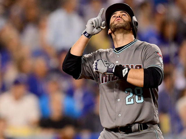LOS ANGELES, CA - OCTOBER 06: J.D. Martinez #28 of the Arizona Diamondbacks celebrates after hitting a solo home run in the sixth inning against the Los Angeles Dodgers in game one of the National League Division Series at Dodger Stadium on October 6, 2017 in Los Angeles, California.