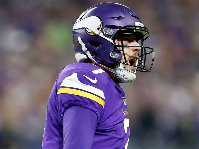 MINNEAPOLIS, MN - JANUARY 14: Case Keenum #7 of the Minnesota Vikings celebrates after a touchdown against the New Orleans Saints during the first half of the NFC Divisional Playoff game at U.S. Bank Stadium on January 14, 2018 in Minneapolis, Minnesota.