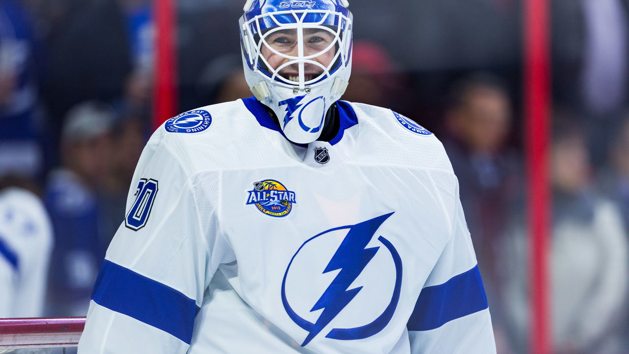 OTTAWA, ON - JANUARY 06: Tampa Bay Lightning Goalie Louis Domingue (70) smiles during warm-up before National Hockey League action between the Tampa Bay Lightning and Ottawa Senators on January 6, 2018, at Canadian Tire Centre in Ottawa, ON, Canada.
