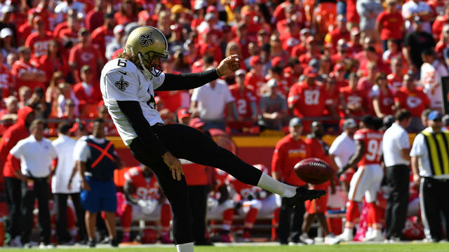 KANSAS CITY, MO - OCTOBER 23: Punter Thomas Morstead #6 of the New Orleans Saints punts the ball to the awaiting Kansas City Chiefs at Arrowhead Stadium during the second quarter of the game on October 23, 2016 in Kansas City, Missouri.