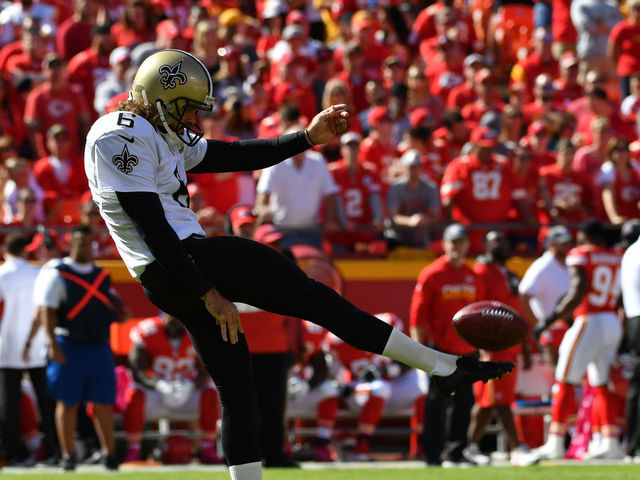 KANSAS CITY, MO - OCTOBER 23: Punter Thomas Morstead #6 of the New Orleans Saints punts the ball to the awaiting Kansas City Chiefs at Arrowhead Stadium during the second quarter of the game on October 23, 2016 in Kansas City, Missouri.