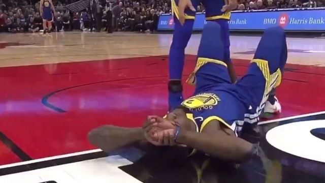 Watch: Warriors' Jordan Bell goes to locker room in wheelchair after injury