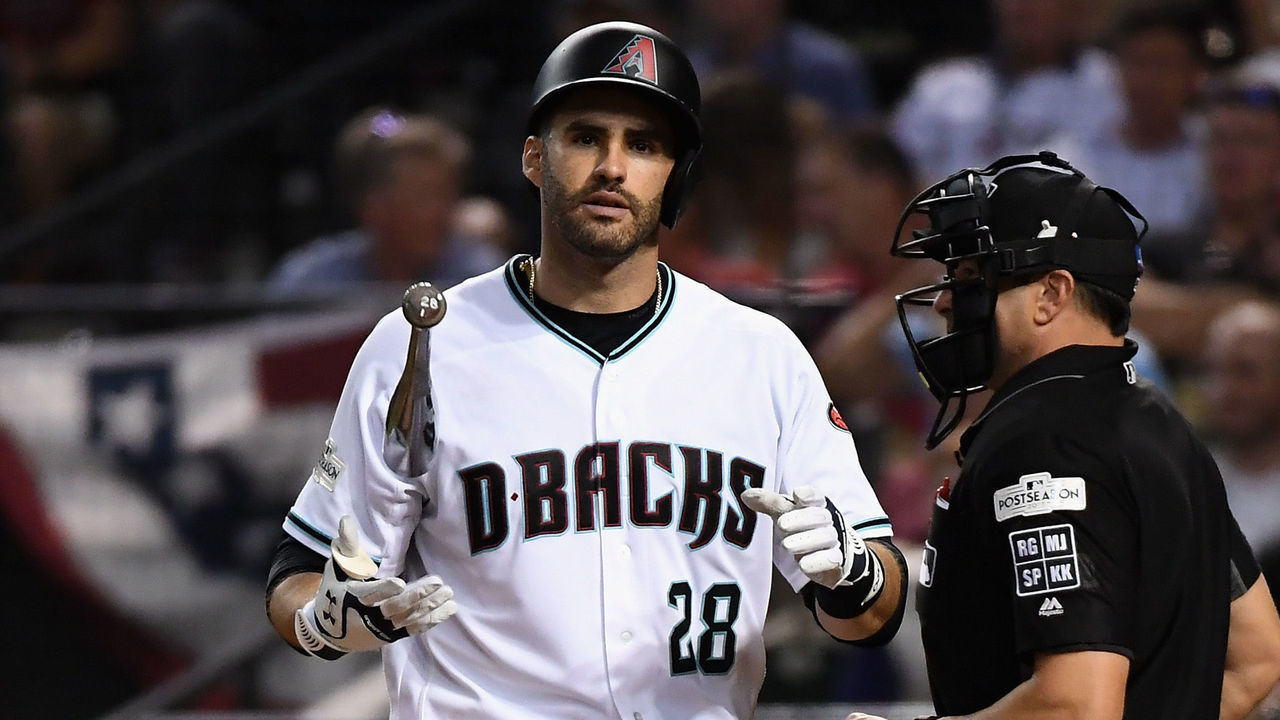 PHOENIX, AZ - OCTOBER 04: J.D. Martinez #28 of the Arizona Diamondbacks reacts after striking out during the bottom of the sixth inning of the National League Wild Card game against the Colorado Rockies at Chase Field on October 4, 2017 in Phoenix, Arizona.