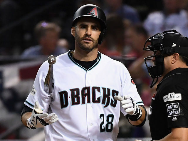 PHOENIX, AZ - OCTOBER 04: J.D. Martinez #28 of the Arizona Diamondbacks reacts after striking out during the bottom of the sixth inning of the National League Wild Card game against the Colorado Rockies at Chase Field on October 4, 2017 in Phoenix, Arizona.