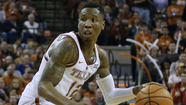 AUSTIN, TX - DECEMBER 29: Kerwin Roach II #12 of the Texas Longhorns moves with the ball against the Kansas Jayhawks at the Frank Erwin Center on December 29, 2017 in Austin, Texas.
