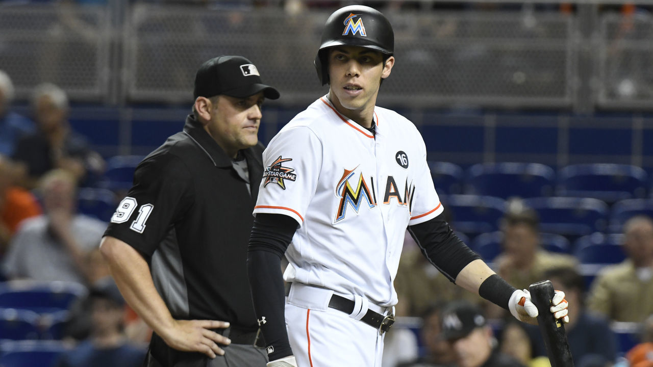 MIAMI, FL - MAY 02: Christian Yelich #21 of the Miami Marlins walks back towards the dugout after arguing with umpire Brian Knight #91 during the eighth inning against the Tampa Bay Rays at Marlins Park on May 2, 2017 in Miami, Florida.