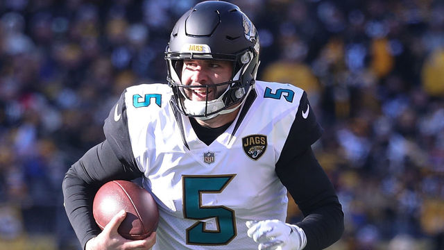 PITTSBURGH, PA - JANUARY 14: Blake Bortles #5 of the Jacksonville Jaguars scrambles with the ball against the Pittsburgh Steelers during the first half of the AFC Divisional Playoff game at Heinz Field on January 14, 2018 in Pittsburgh, Pennsylvania.