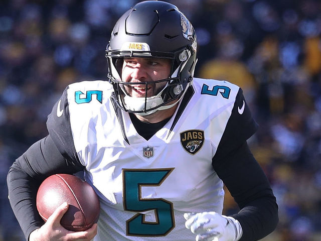 PITTSBURGH, PA - JANUARY 14: Blake Bortles #5 of the Jacksonville Jaguars scrambles with the ball against the Pittsburgh Steelers during the first half of the AFC Divisional Playoff game at Heinz Field on January 14, 2018 in Pittsburgh, Pennsylvania.