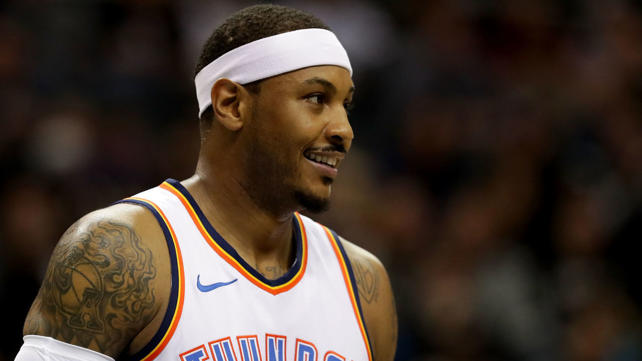 CHARLOTTE, NC - JANUARY 13: Carmelo Anthony #7 of the Oklahoma City Thunder watches on against the Charlotte Hornets during their game at Spectrum Center on January 13, 2018 in Charlotte, North Carolina.
