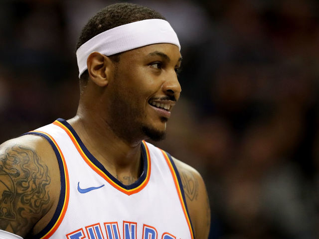 CHARLOTTE, NC - JANUARY 13: Carmelo Anthony #7 of the Oklahoma City Thunder watches on against the Charlotte Hornets during their game at Spectrum Center on January 13, 2018 in Charlotte, North Carolina.