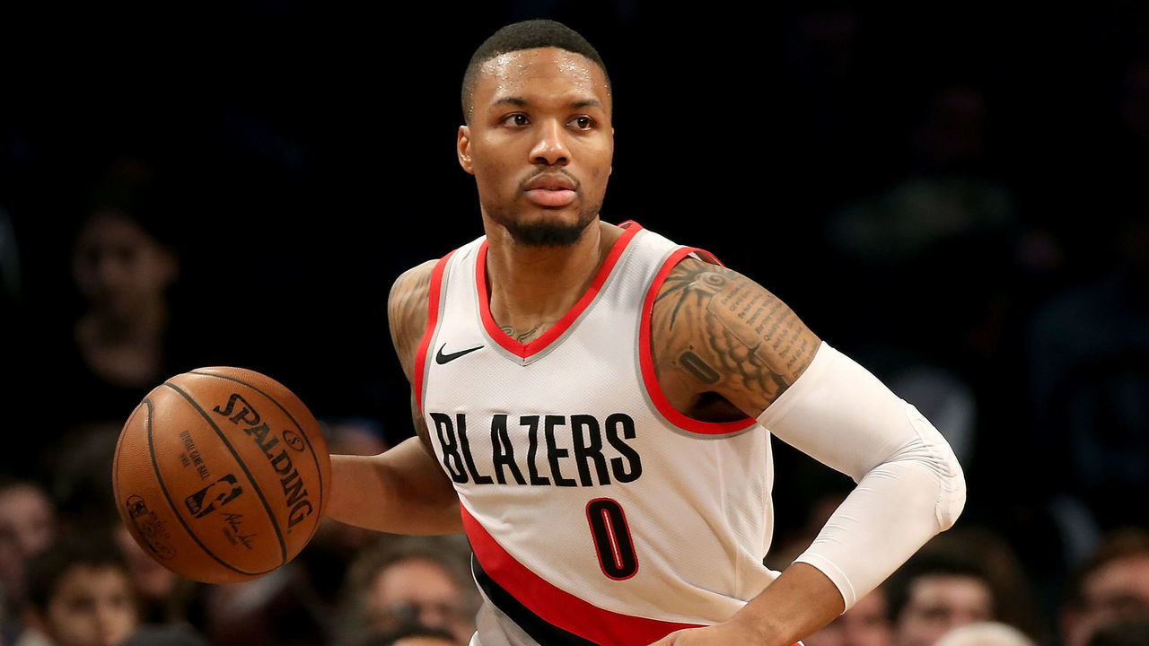 NEW YORK, NY - NOVEMBER 24: Damian Lillard #0 of the Portland Trail Blazers drives to the basket in the third quarter against the Brooklyn Nets at Barclays Center on November 24, 2017 in the Brooklyn borough of New York City.