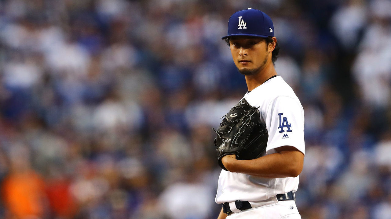 LOS ANGELES, CA - NOVEMBER 01: Yu Darvish #21 of the Los Angeles Dodgers reacts in the first inning against the Houston Astros in game seven of the 2017 World Series at Dodger Stadium on November 1, 2017 in Los Angeles, California.