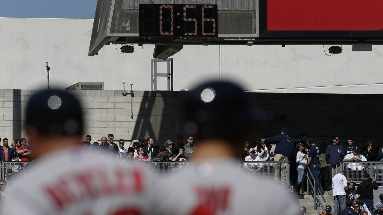 NEW YORK, NY - APRIL 11: A clock used to time pitching changes runs in left field as the Boston Red Sox face the New York Yankees at Yankee Stadium on April 11, 2015 in the Bronx borough of New York City.