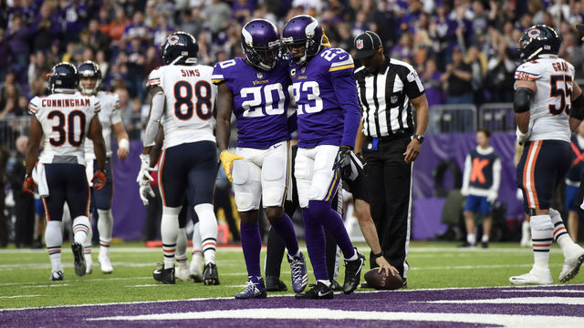 MINNEAPOLIS, MN - DECEMBER 31: Mackensie Alexander #20 of the Minnesota Vikings celebrates with teammate Terence Newman #23 turning over the Chicago Bears in the fourth quarter of the game on December 31, 2017 at U.S. Bank Stadium in Minneapolis, Minnesota.