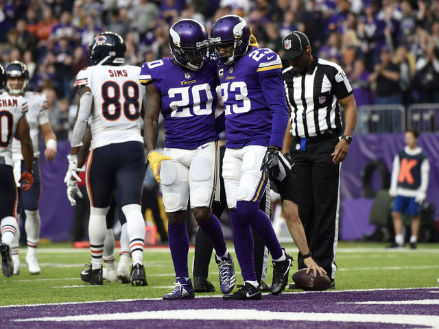MINNEAPOLIS, MN - DECEMBER 31: Mackensie Alexander #20 of the Minnesota Vikings celebrates with teammate Terence Newman #23 turning over the Chicago Bears in the fourth quarter of the game on December 31, 2017 at U.S. Bank Stadium in Minneapolis, Minnesota.