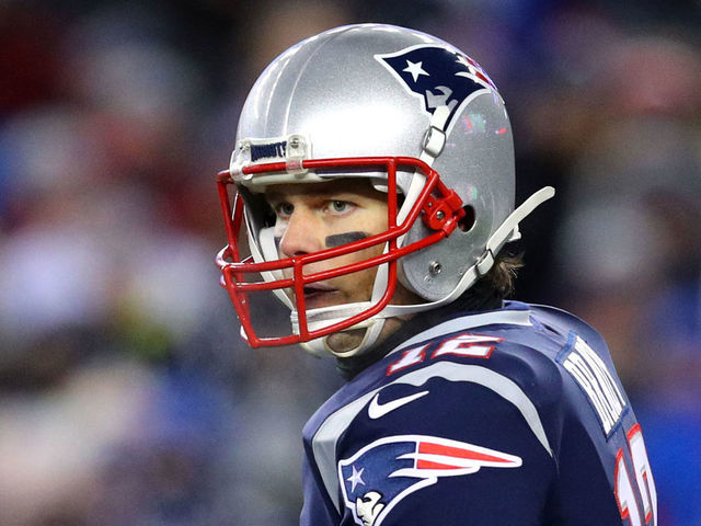 FOXBOROUGH, MA - JANUARY 13: Tom Brady #12 of the New England Patriots looks on during the AFC Divisional Playoff game against the Tennessee Titans at Gillette Stadium on January 13, 2018 in Foxborough, Massachusetts.