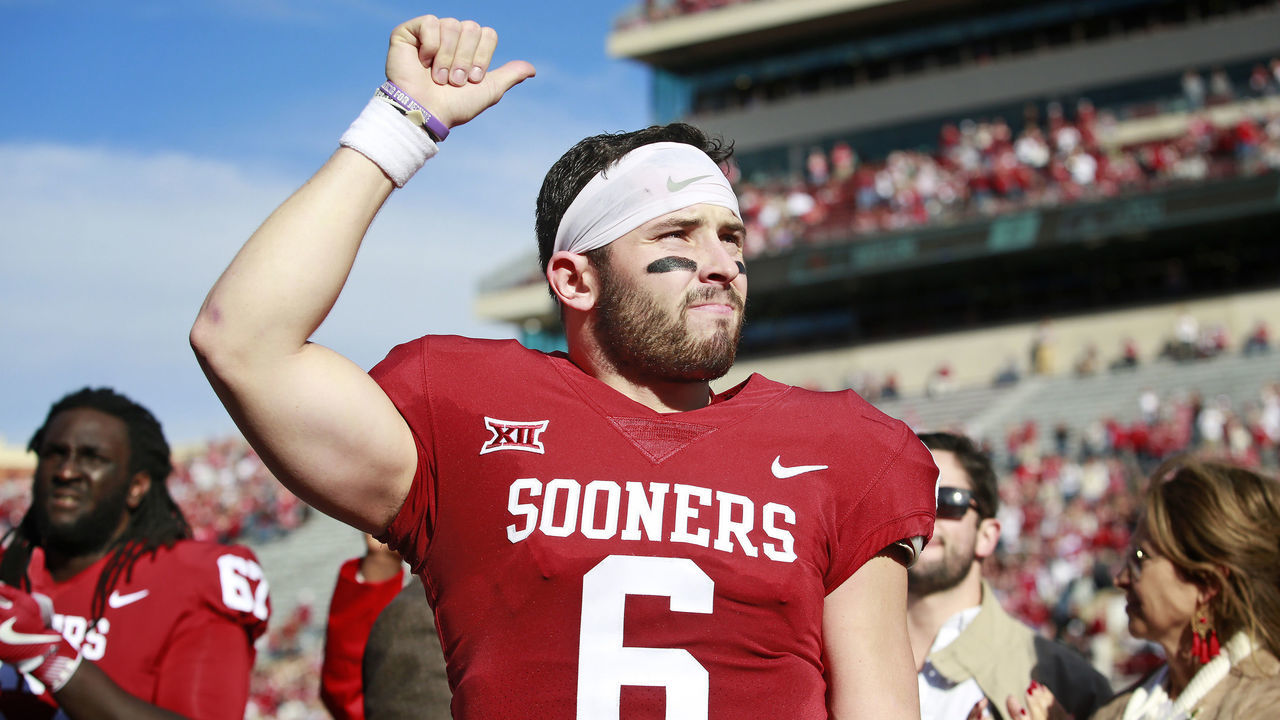 NORMAN, OK - NOVEMBER 25: Quarterback Baker Mayfield #6 of the Oklahoma Sooners gestures to the crowd after Senior Day announcements before the game against the West Virginia Mountaineers at Gaylord Family Oklahoma Memorial Stadium on November 25, 2017 in Norman, Oklahoma. Oklahoma defeated West Virginia 59-31.