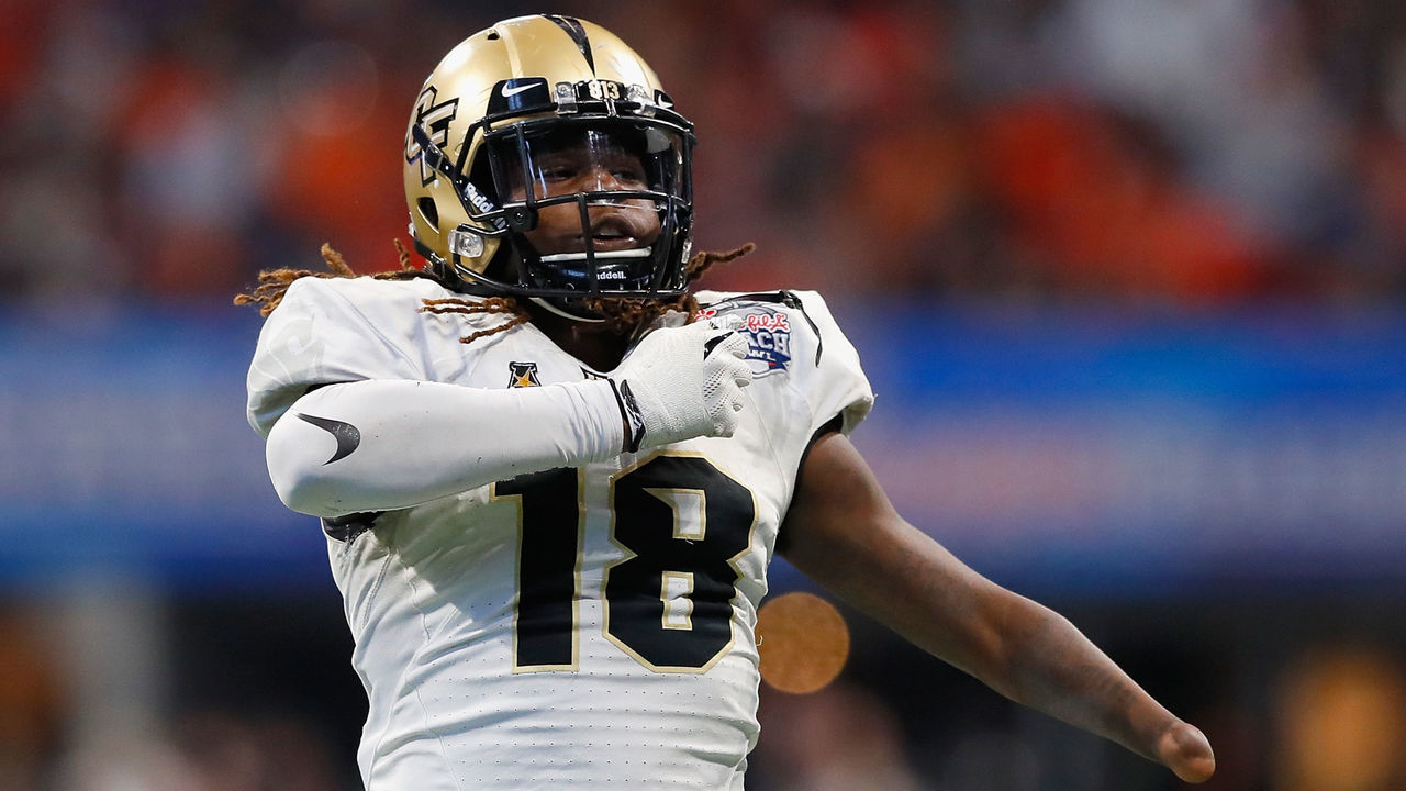 ATLANTA, GA - JANUARY 01: Shaquem Griffin #18 of the UCF Knights celebrates after sacking Jarrett Stidham #8 of the Auburn Tigers (not pictured) in the second half during the Chick-fil-A Peach Bowl at Mercedes-Benz Stadium on January 1, 2018 in Atlanta, Georgia.