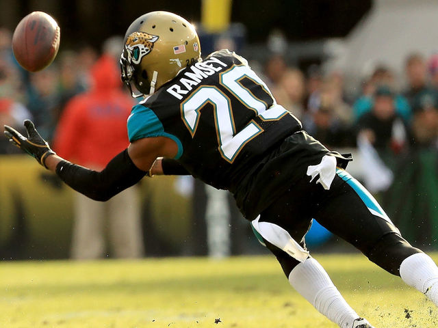 JACKSONVILLE, FL - JANUARY 07: Jalen Ramsey #20 of the Jacksonville Jaguars makes an interception during AFC Wild Card playoff game against the Buffalo Bills at EverBank Field on January 7, 2018 in Jacksonville, Florida.