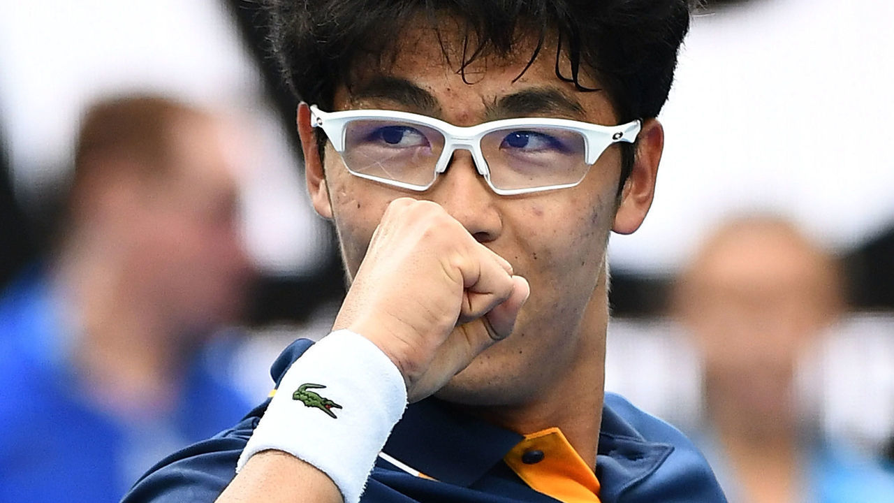 MELBOURNE, AUSTRALIA - JANUARY 20: Hyeon Chung of Korea celebrates after winning his third round match against Alexander Zverev of Germany on day six of the 2018 Australian Open at Melbourne Park on January 20, 2018 in Melbourne, Australia.